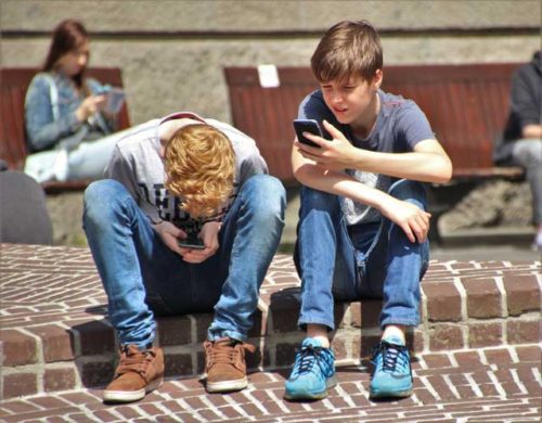 Kids playing Pokemon Go game